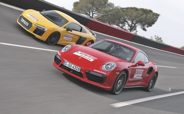 სუპერსპორტულების დუელი: Audi R8 VS Porsche 911 (+ ვიდეო)